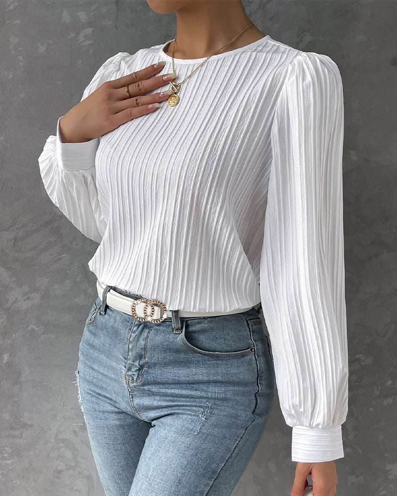 Plain blouse with lantern sleeve