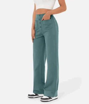 High-waisted elastic trousers