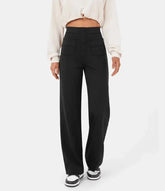 High-waisted elastic trousers