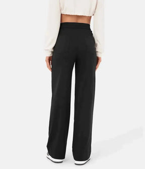 High-waisted elastic trousers